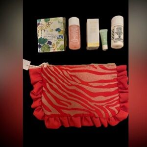 Sisley clutch with red ruffled zebra print with new Sisley samples